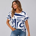Woman wearing the navy and white abstract print tee