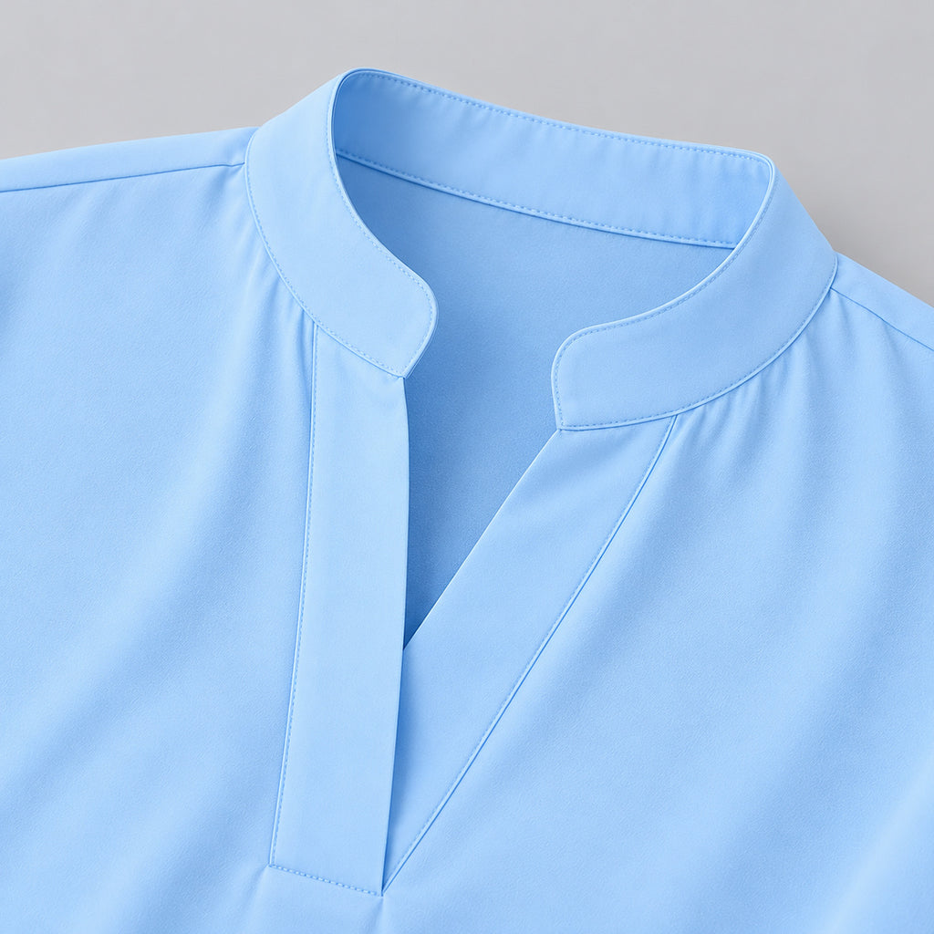 Close-up of the band collar and split neckline